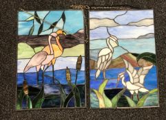 Two stained glass panels depicting stalks and flamingos
