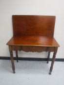 A Victorian mahogany turnover top tea table