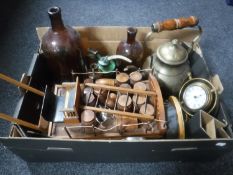 A box containing antique glass bottles, WSCO oil can, wooden cart with barrels, ship's brass clock,