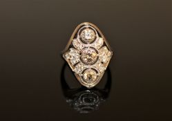 A 14ct white gold diamond ring, with three central brilliant-cut diamonds weighing 0.