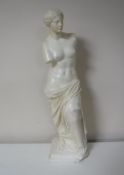 A painted composition figure of the Venus De Milo