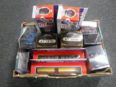 A box containing Batman detective comics vehicles, Chuggington die cast trains,