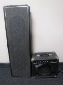 A vintage Fender guitar amplifier together with a vintage practice speaker