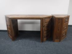 A reclaimed pine kneehole desk fitted two cupboards,