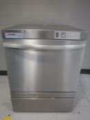 A stainless steel Winterhalter GS302 commercial glass washer