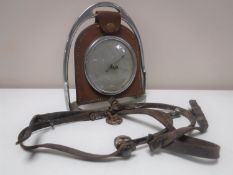 An early twentieth century 'stirrup' barometer and two small stirrups