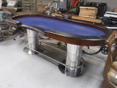 A casino croupier's table on twin pedestal base