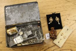 A pair of antique style yellow metal pendant earrings together with carved netsuke,