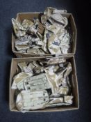 Two boxes containing army issue pouches