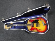 A vintage Japanese made Commodore electric guitar in carry case