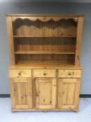 A pine triple door kitchen dresser