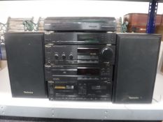 A Technics five-piece separates system with speakers