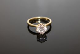 A 14ct yellow gold diamond solitaire ring, the brilliant-cut stone of 1.