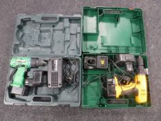A cased JCB electric drill with battery and charger in Bosch box,