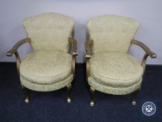 A pair of painted mid 20th century bedroom armchairs