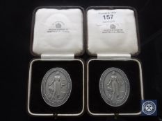 Two cased silver medals 