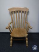 A pine country kitchen armchair