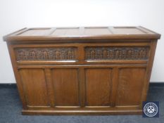 An Edwardian oak bedding box