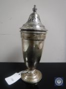 A silver sugar sifter,