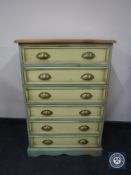 A pine painted six drawer chest with brass handles