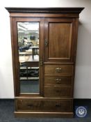 A Victorian inlaid mahogany compactum wardrobe