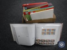A box of five 20th century stamp albums,
