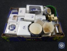 A box of boxed and unboxed Ringtons china and die cast vehicles