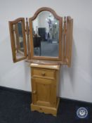 A pine bedside cabinet and a pine triple dressing mirror