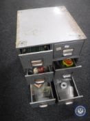 A mid 20th century metal topped six drawer index chest containing hand tools