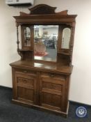 An Edwardian mirror back sideboard