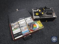 A boxed Sinclair ZX Spectrum and a case of games