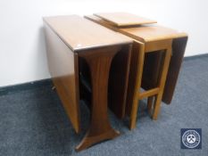 Two drop leaf teak tables and a lazy Susan