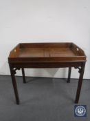 A mahogany butler's tray on stand