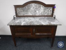 A Victorian inlaid mahogany marble topped wash stand
