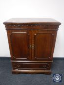 A mahogany TV cabinet