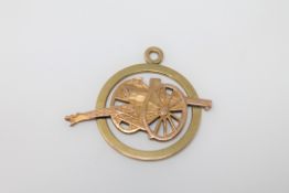 An 18ct gold French artillery pendant