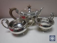 A silver three piece tea service, London 1919, 1603.5g.