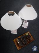 A tray of two tribal wall masks, assorted animals ornaments,