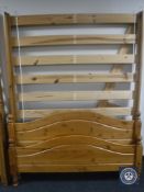 A 5' pine bed frame