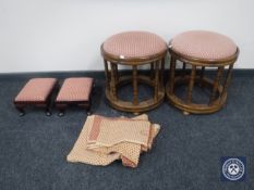 A pair of circular footstools and one other pair footstools
