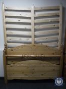 A 5' pine bed frame