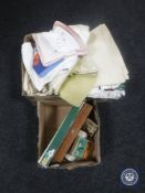 Two boxes of table linen,