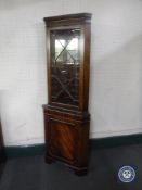 A Regency style corner display cabinet