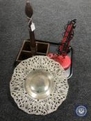 A wooden wine bottle caddy,