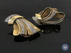 A pair of 18ct gold diamond set clip earrings.