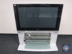 A Panasonic Viera 42 inch plasma TV on stand and remote