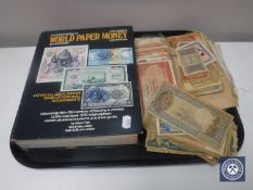 A tray of bank notes of the world,