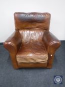 A brown leather armchair