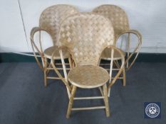 Three bamboo armchairs