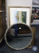 A 1930's oval mirror, gilt picture of Bamburgh castle,